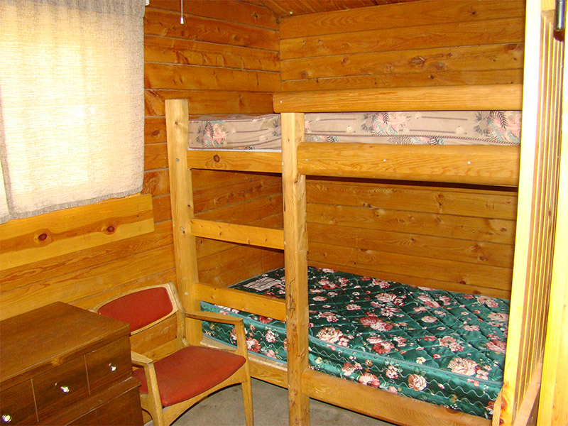 Bunk beds inside log cabin